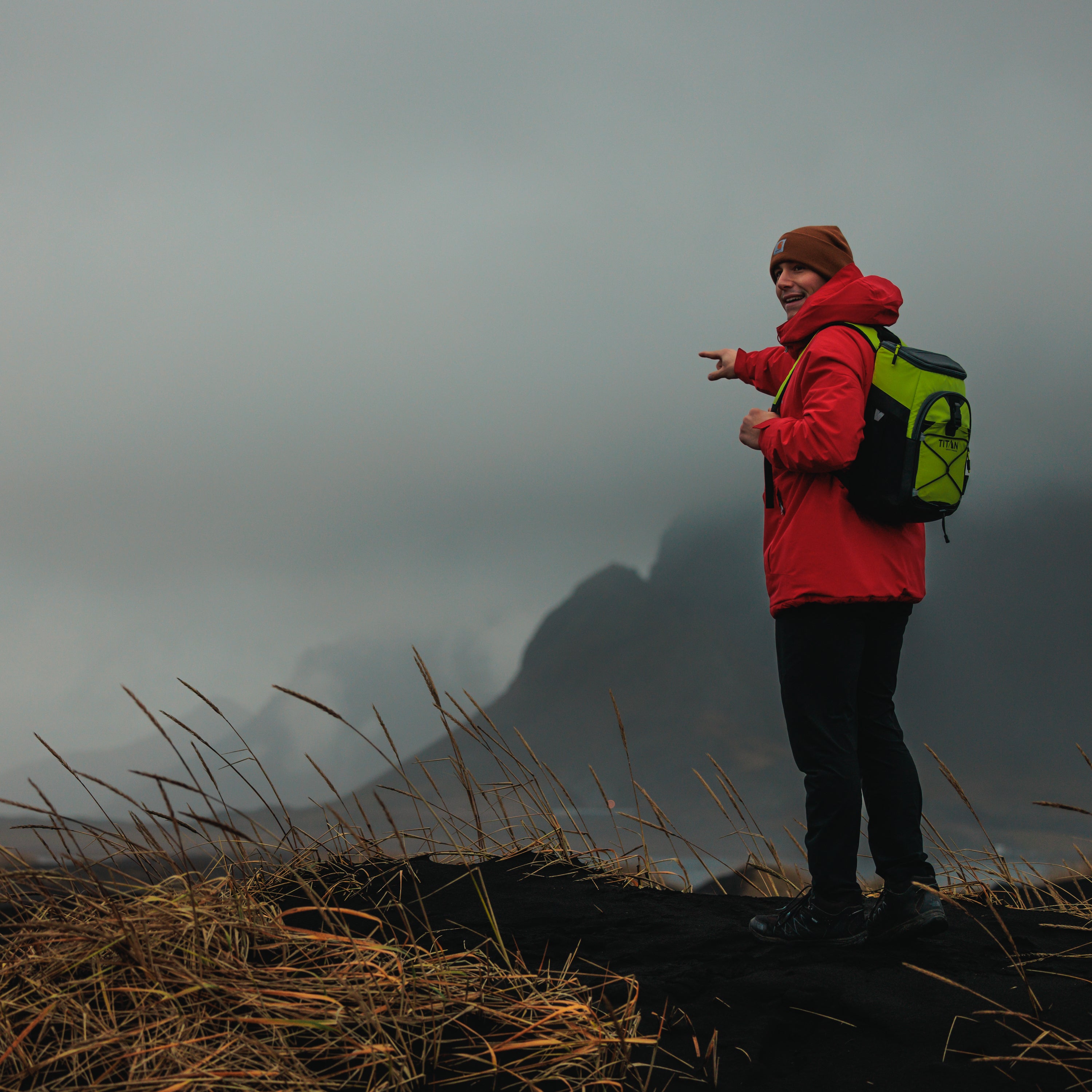 Guy hiking with a Titan Backpack Cooler