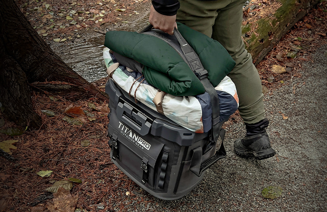 Person carrying a Titan PRO Welded Zipperless Cooler